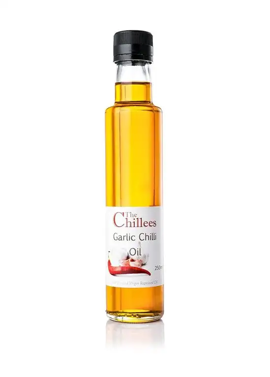 The Chillees Würziges Knoblauchöl 1 Flasche 250 ml Ideal für Liebhaber der würzigen Küche Naturprodukt ohne Konservierungsstoffe Für Ihre Zubereitungen, Pizzen, Salate oder Sonstiges