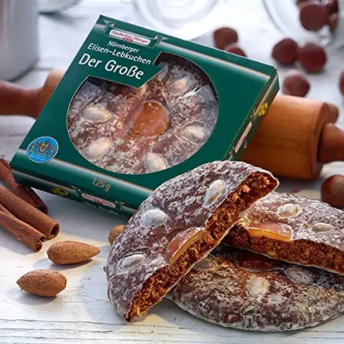 Der Große Lebkuchen 375g ( 1 Packung ) Fein glasiert und mit Mandeln und Orangeat dekoriert, ist er mit 13 cm Ø unser größter Elisen-Lebkuchen. Original Haeberlein-Metzger.